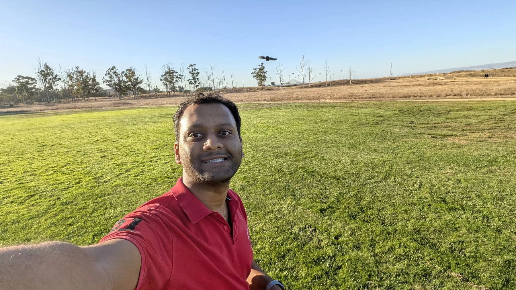 The athlete with a drone hovering behind